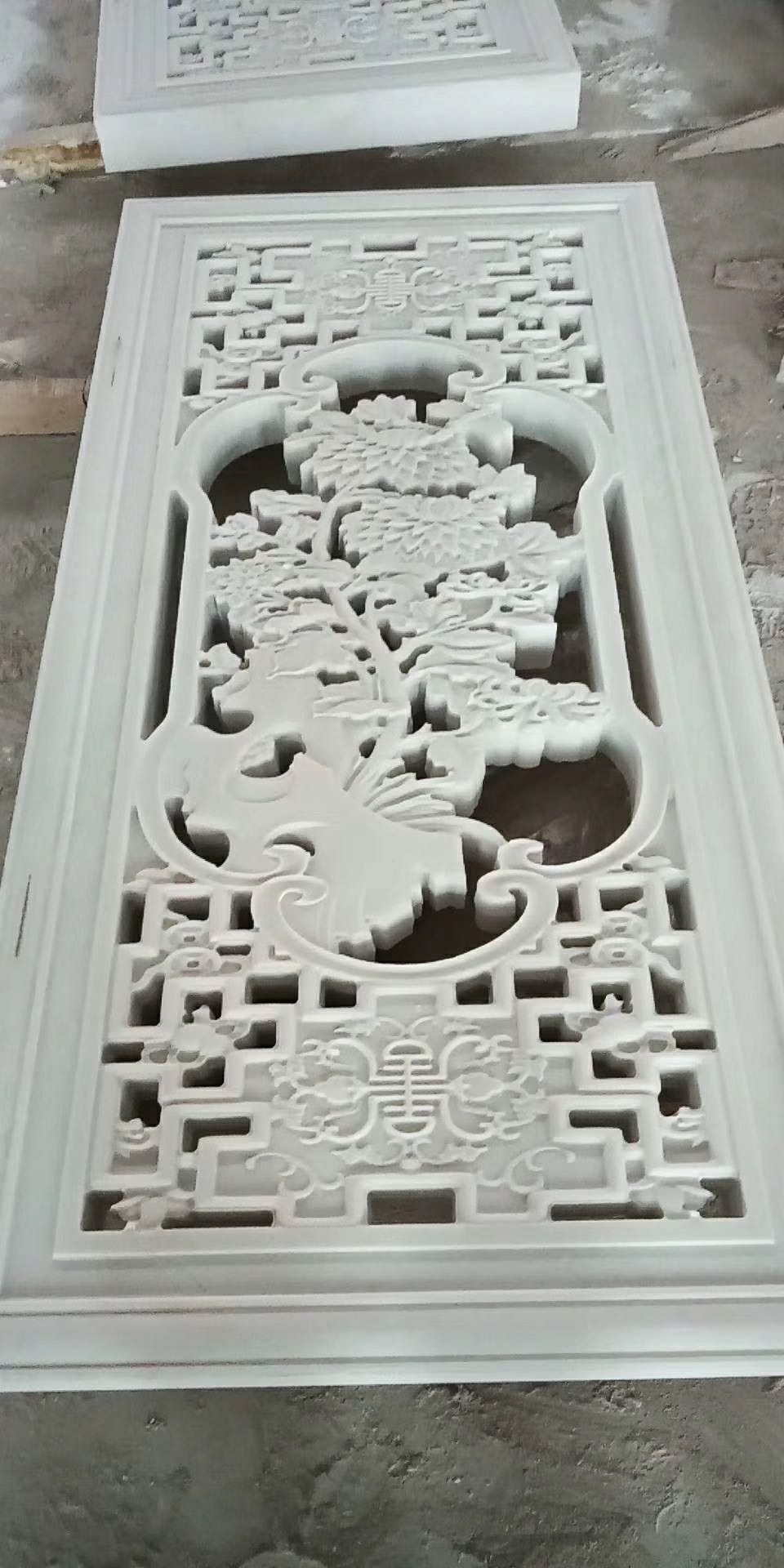 萊州雪花白石材浮雕